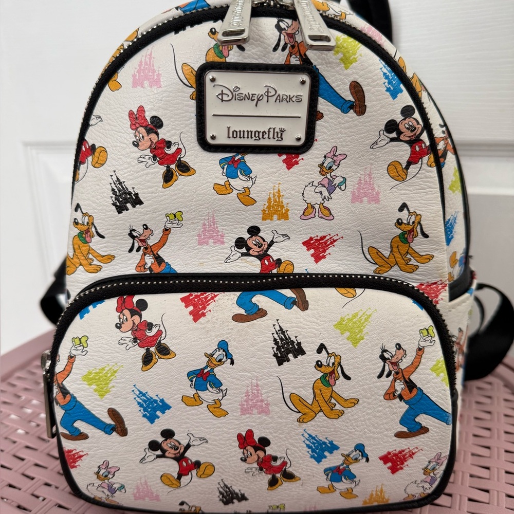 Loungefly Disney Parks Character Print Backpack